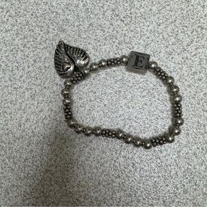 Silver elastic bracelet E charm, heart wings charm